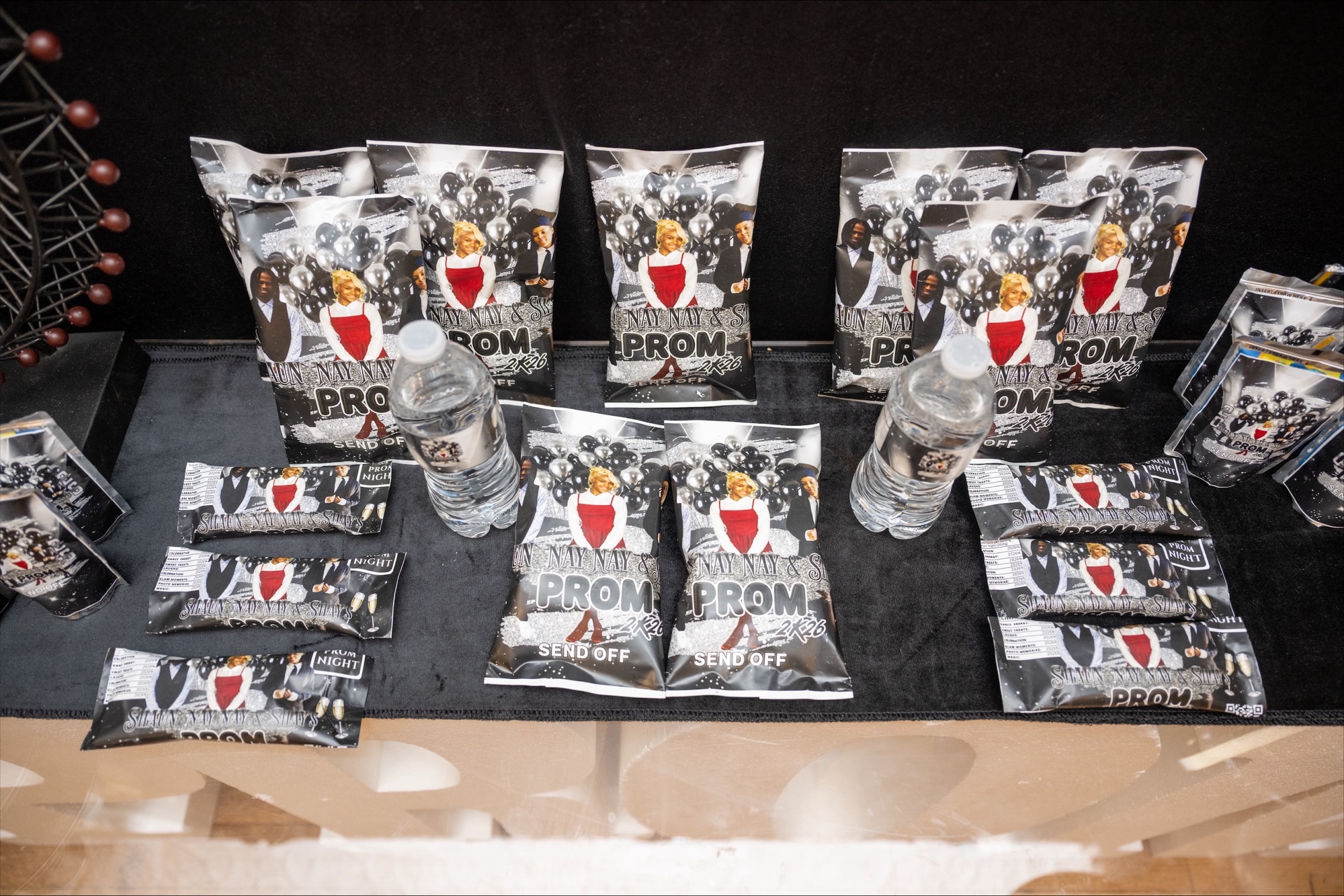Custom event favors and prom-themed setup by The Catherine